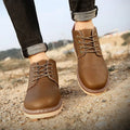 Men's black mid-top British leather boots with rubber sole and lace-up closure