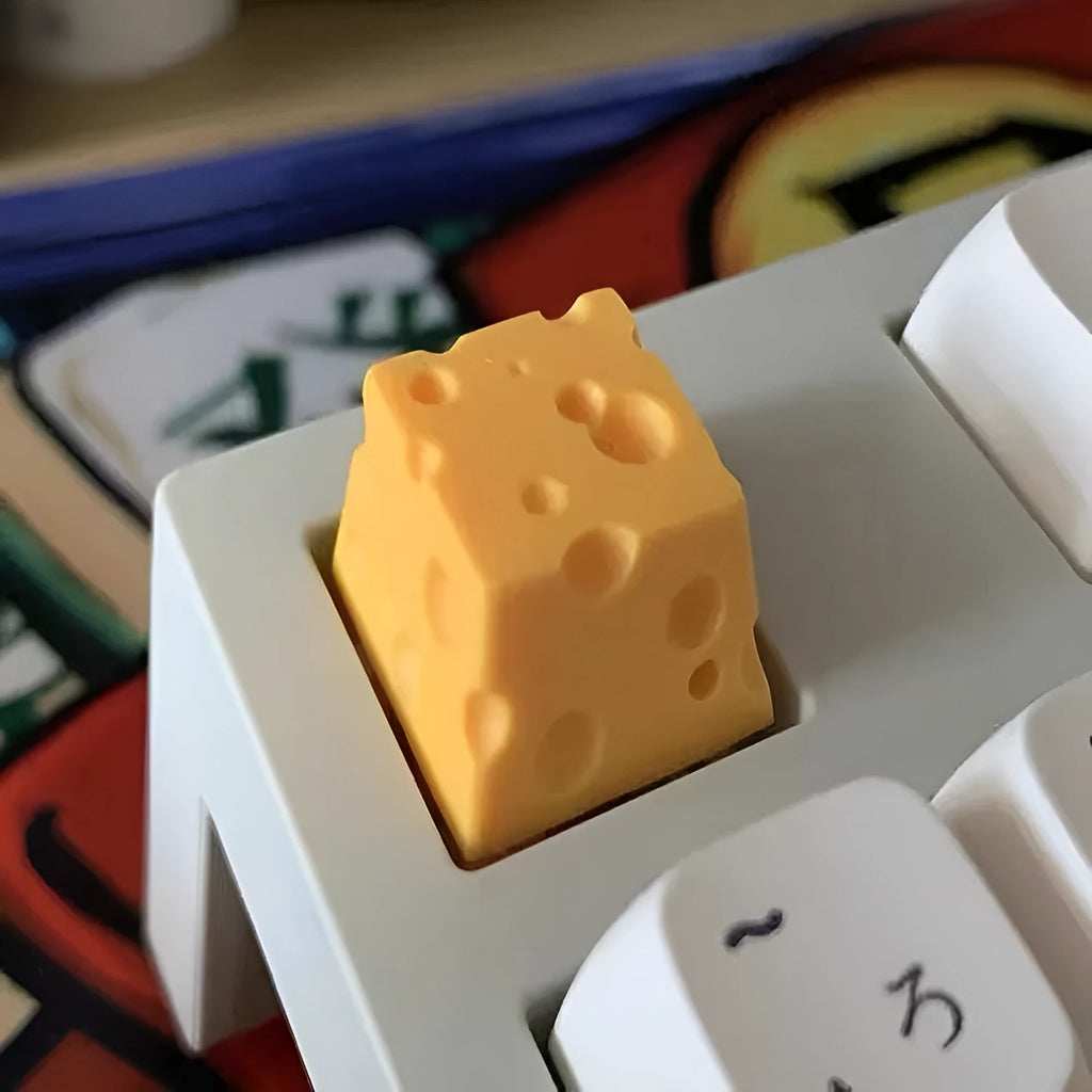 Yellow resin cheese wedge artisan keycap for mechanical keyboards with Cherry MX stem