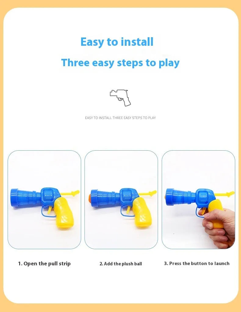 Pet toy set showing 30cm plush launcher gun and several soft 3cm yarn balls for dog fetch games