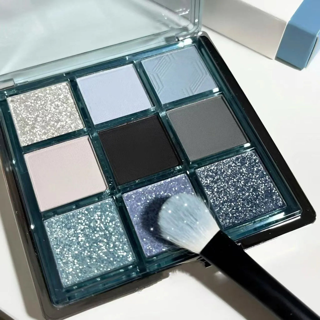 MUGELEEN nine-colour eye shadow palette showing low saturation shades with matte and shimmer finishes