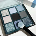 MUGELEEN nine-colour eye shadow palette showing low saturation shades with matte and shimmer finishes