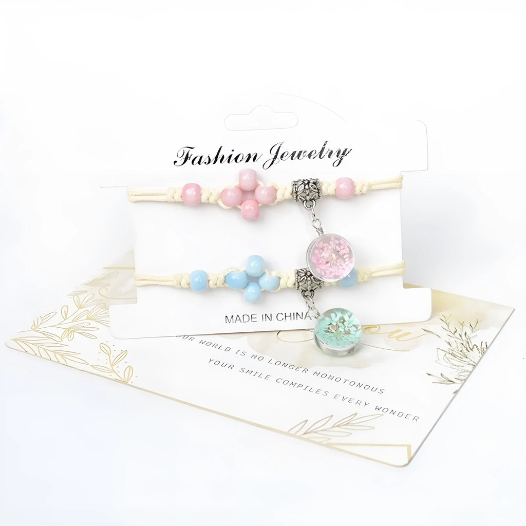 Glass dried flower bracelet with preserved flowers inside clear beads, available in multiple colours