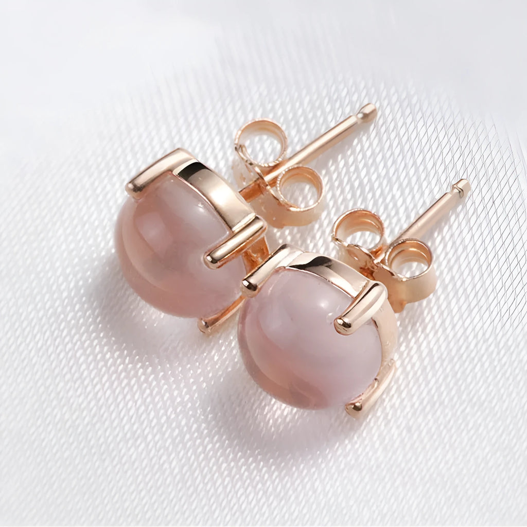 Women's Korean style drop-shaped stud earrings with synthetic Ross quartz stones in rose gold plating