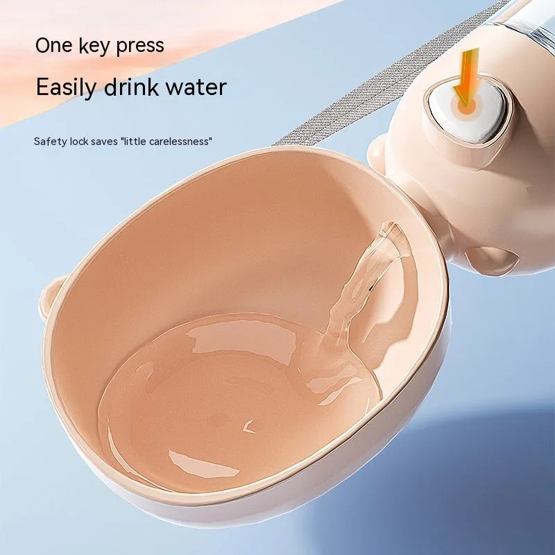 Portable dog water bottle and attached feeding bowl in yellow, pink, or brown for outdoor travel.