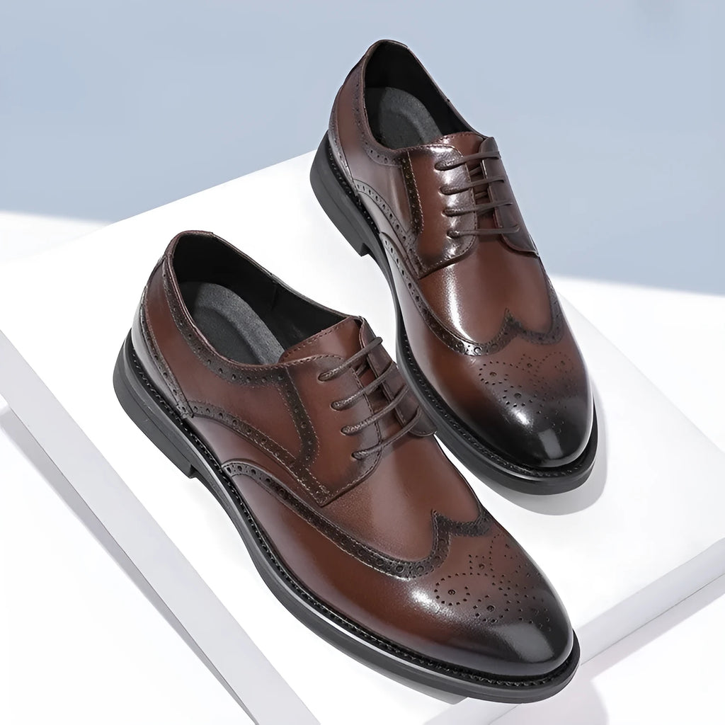 Men's black and brown brogue Oxford-style formal shoes with classic perforated detailing.