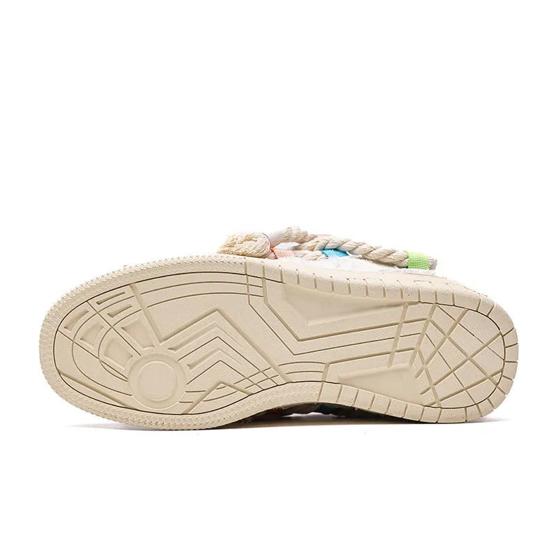 Creamy white retro low-top skate shoes with old damage lace and a platform sole