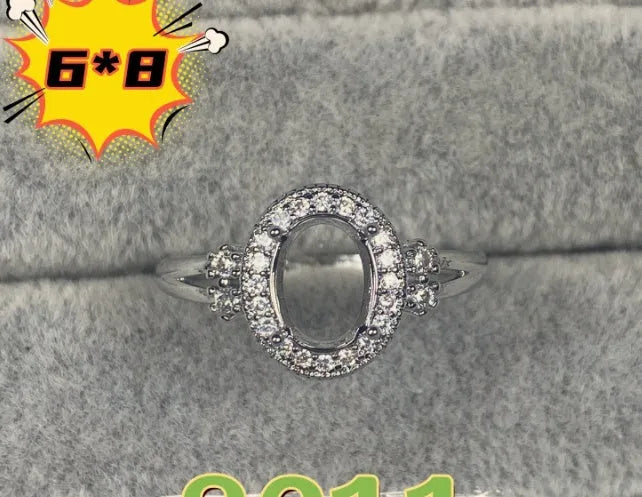 Oval denier ring with open mouth design, 6x8mm main stone and five-pointed star decoration