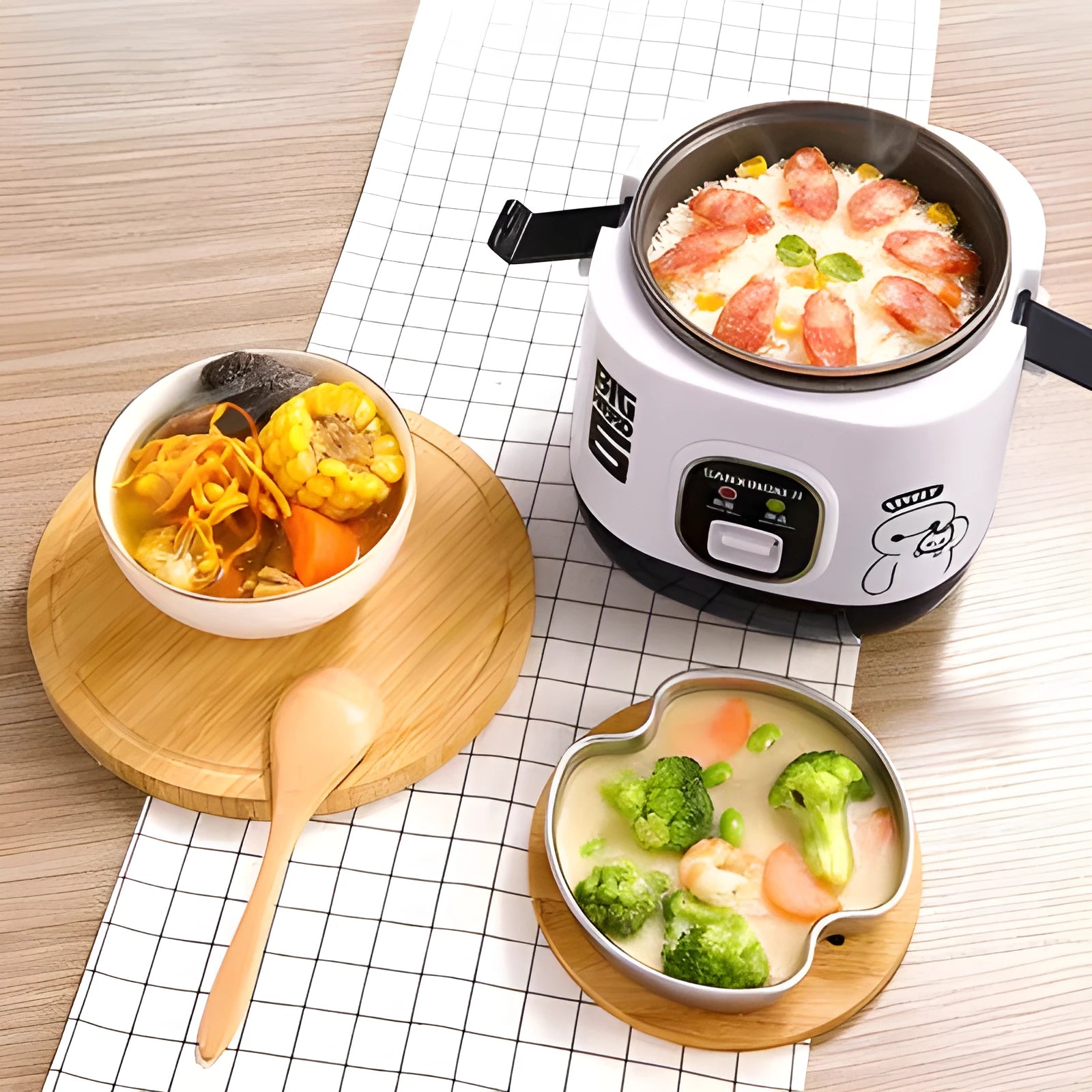 Compact round miniature rice cooker with steaming tray in various colour options