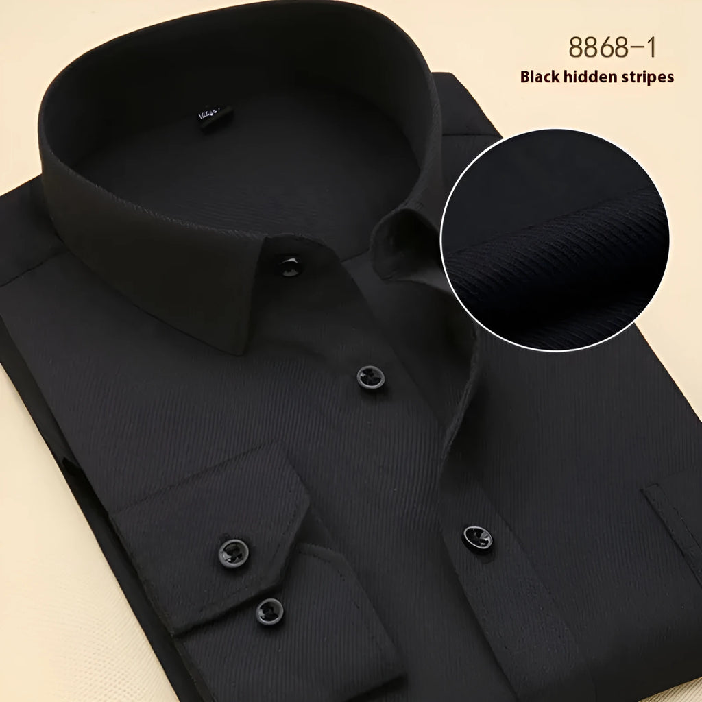 Men's black solid colour long sleeve cotton business shirt with a slim fit on a hanger.