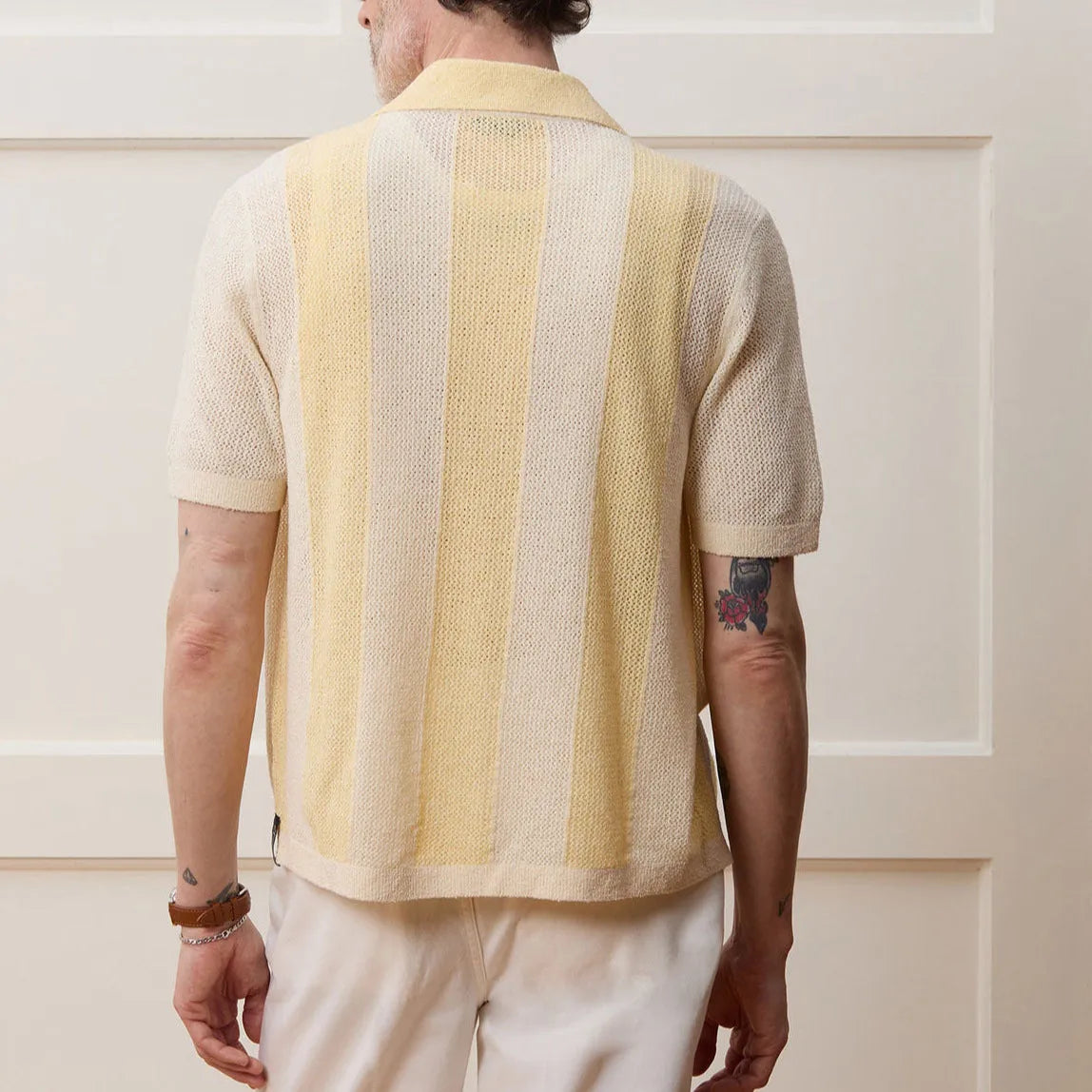 Yellow men's casual polo shirt with hollow-out pattern and asymmetric design in Tencel fabric