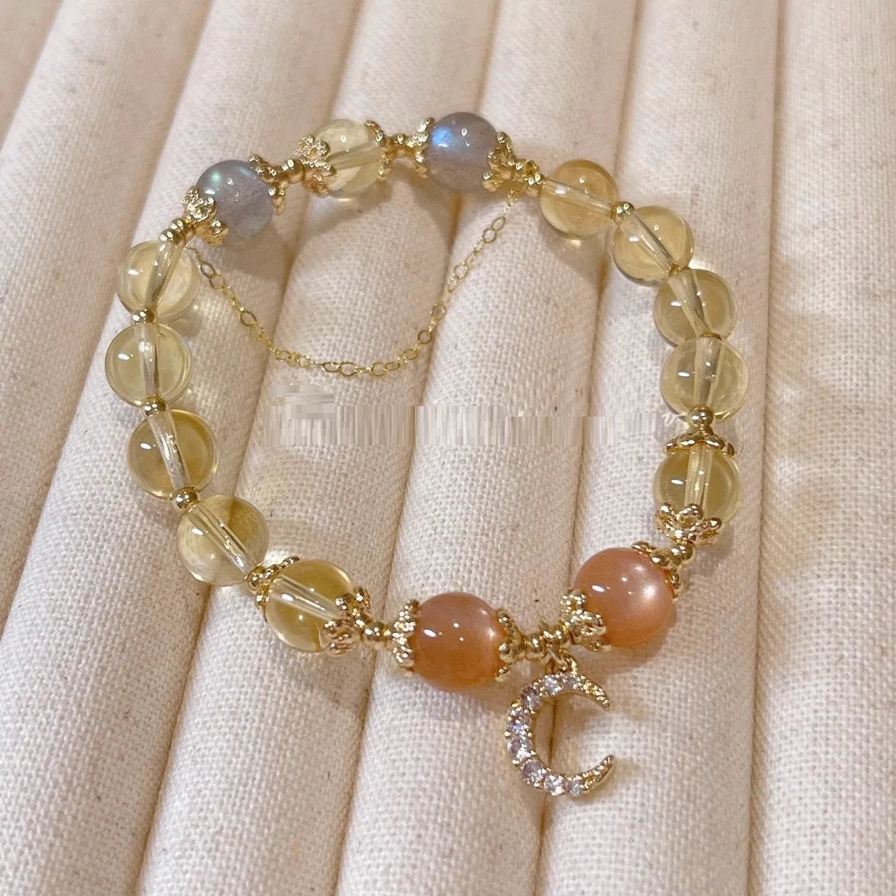 Chinese style women's crystal bracelet with electroplated 14K gold finish and diamond shape design