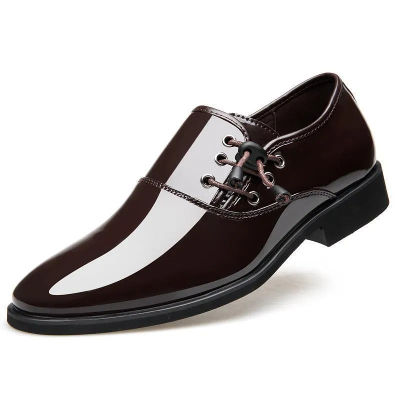 Men's black formal slip-on shoes with a round toe and square heel on a rubber sole.