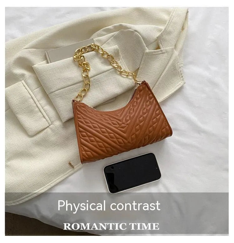 Black PU leather vertical square shoulder bag with chain strap, soft handle, and 3D outer pockets