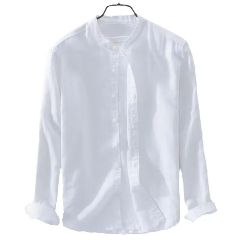 Loose fit long sleeve cotton linen shirt in solid colours on a hanger.