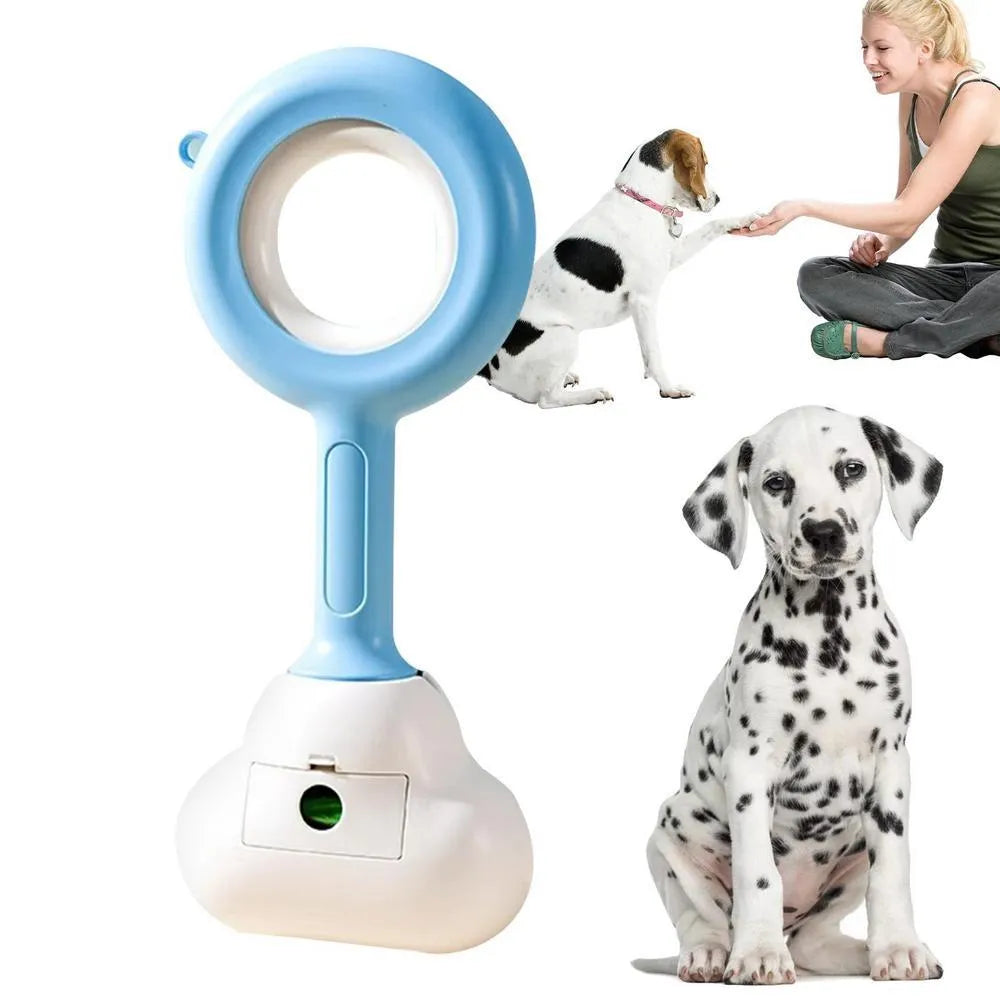 White blue and beige coloured cloud jaw design dog pooper scooper on a green lawn.