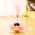 Pink cat stick toy with self-hi tumbler turntable measuring 17 cm by 10 cm