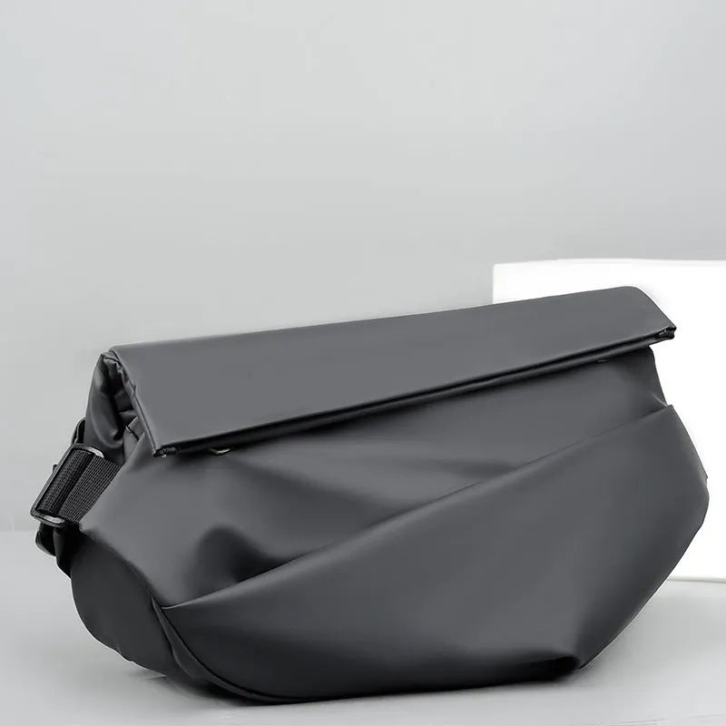 Grey medium crossbody bag with zipper opening showing internal phone and document compartments