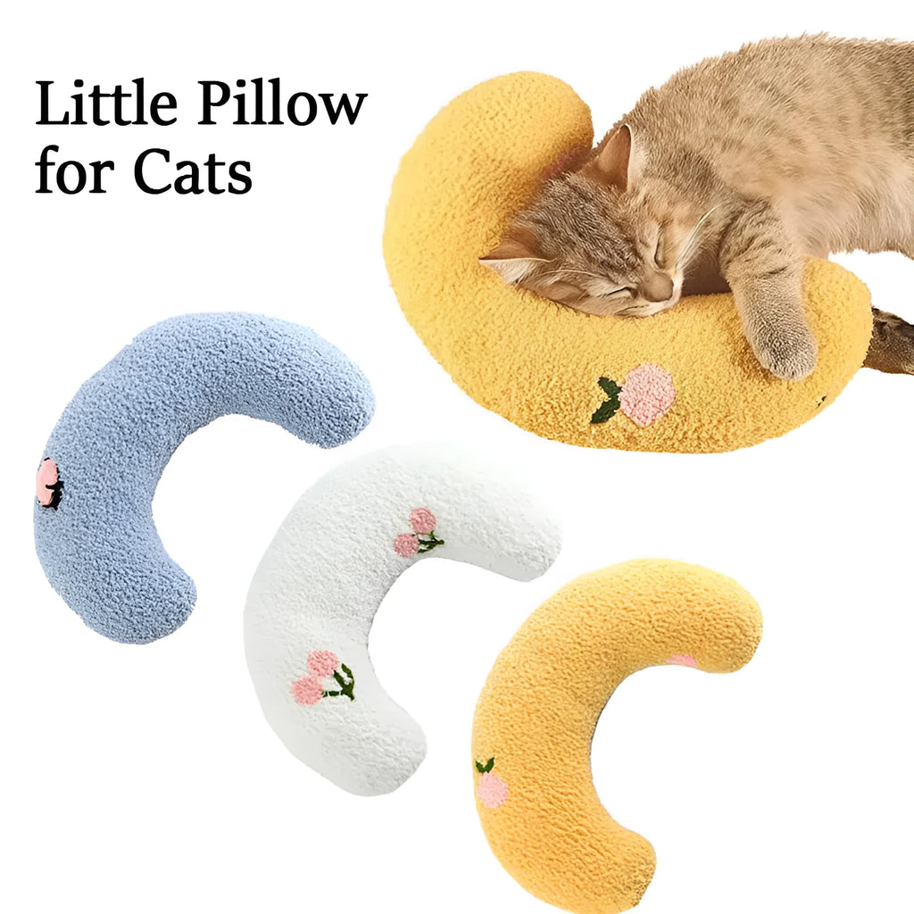 Plush U-shaped pet pillow for small cats and dogs in blue, showing quilted faux fur texture.