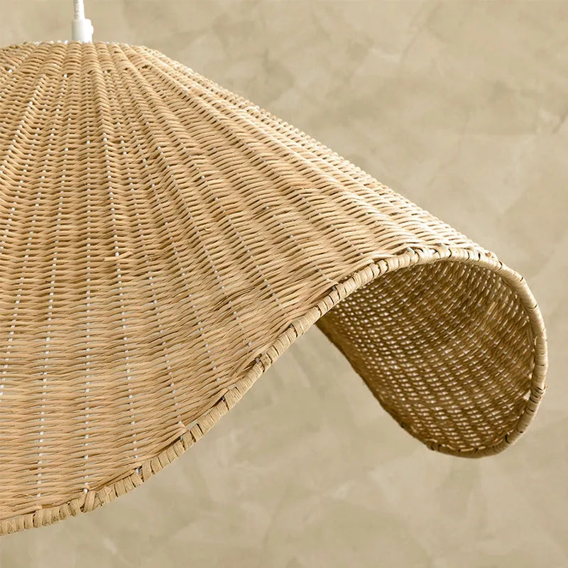 Handwoven natural rattan and willow bamboo chandelier with warm white LED light in three size diameters.