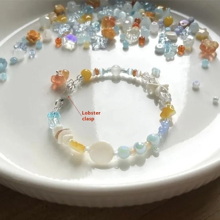 Mixed material alloy bracelet with diamond shape links and round detailing in colour Bracelet 0213