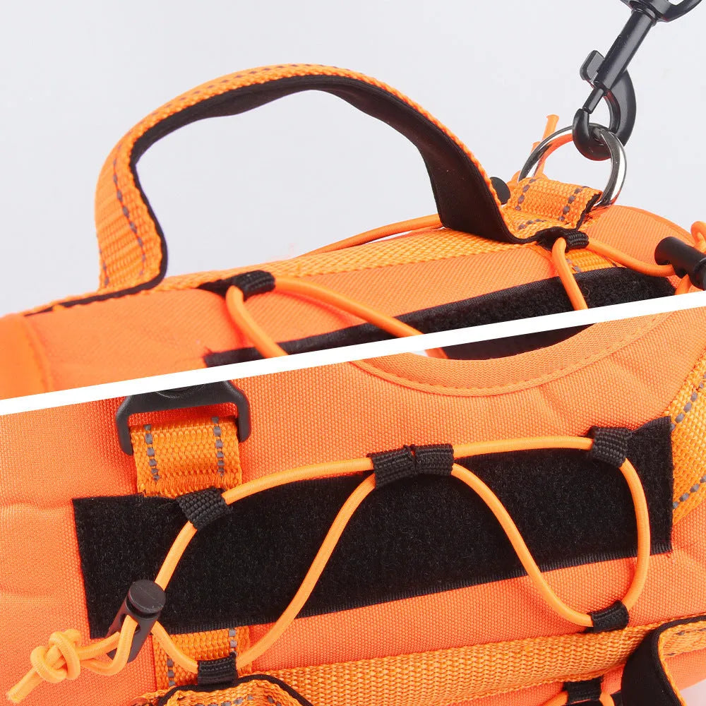 Orange reflective dog vest harness with integrated black hand-grip rope leash on a dog.