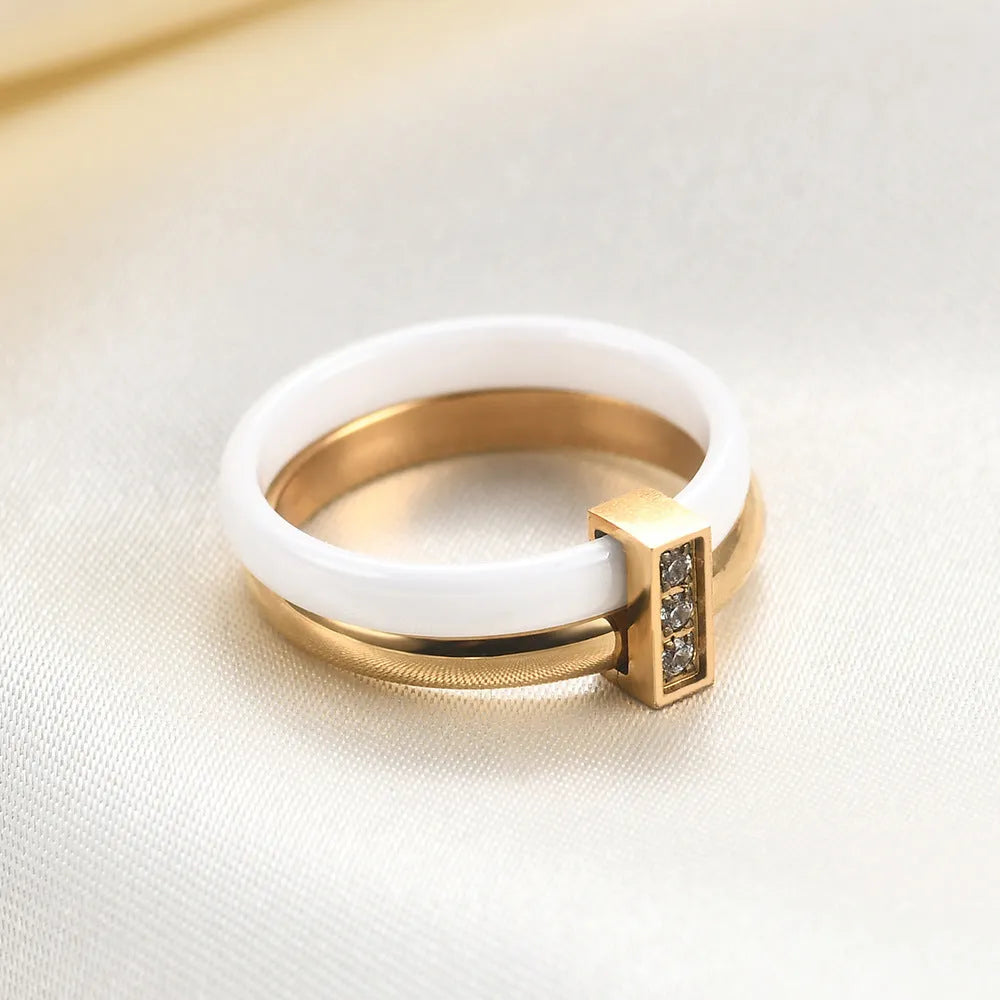 Women's ceramic ring with 6mm band width, geometric round shape, and glossy stitching detail in steel black finish
