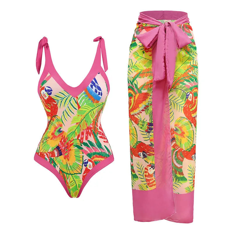 Retro pink floral print one-piece swimsuit with V-neck, covered belly, and thin skirt