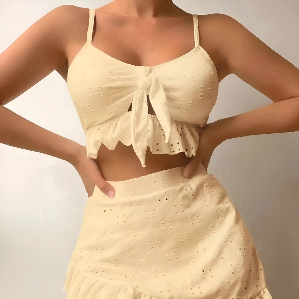 Women's three-piece bikini set with split hip skirt in polyester fabric for swimming