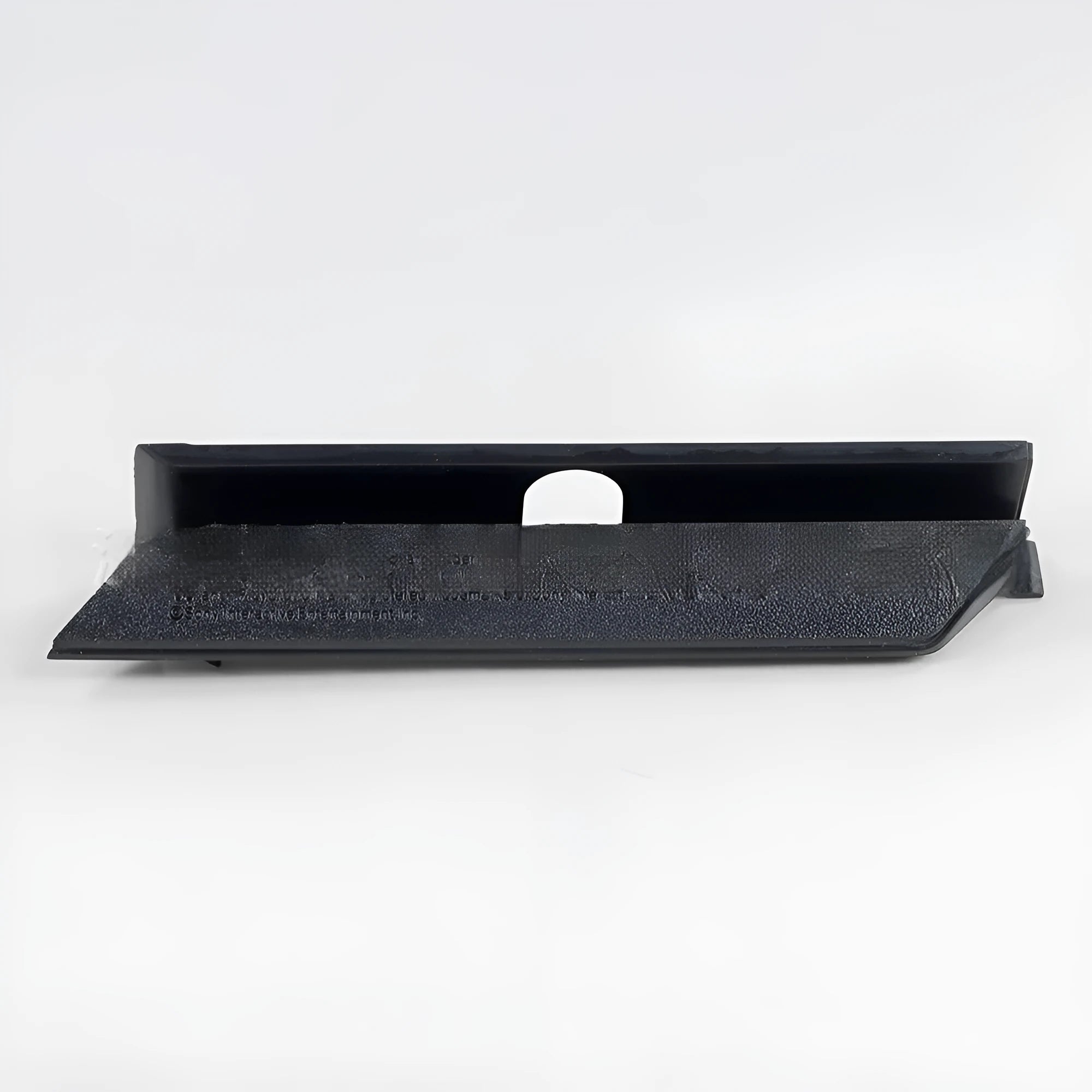 Black and white plastic hard drive bay cover for PC case installation