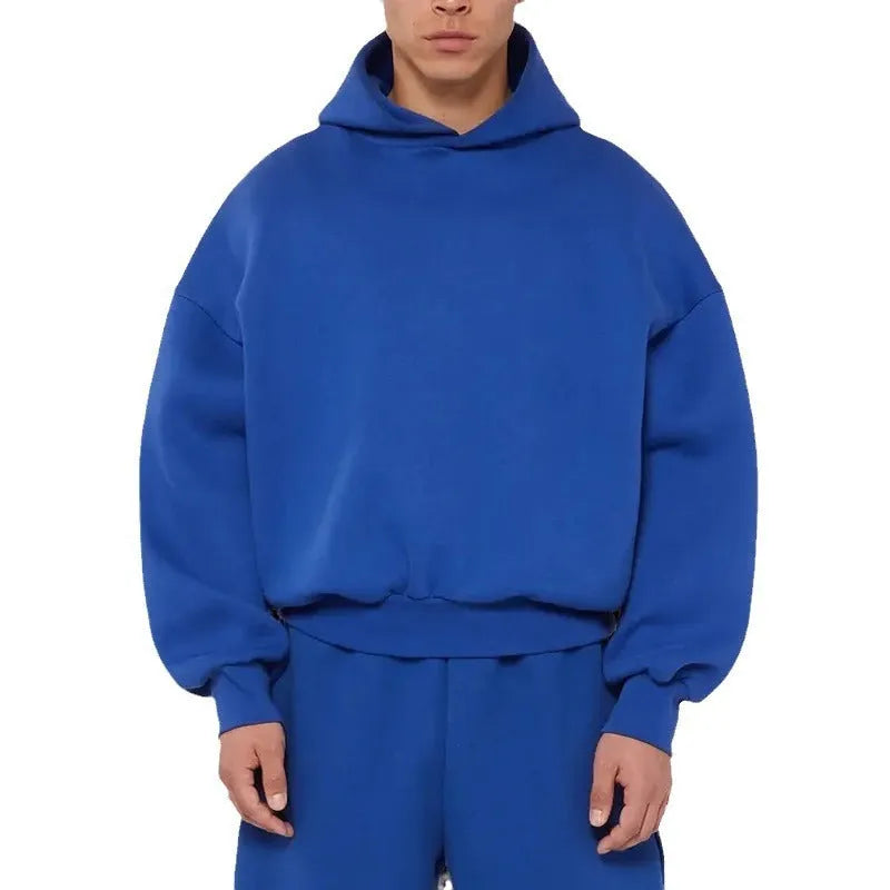 Men's grey fleece-lined cotton hoodie sweater with a wool lining and pullover design.