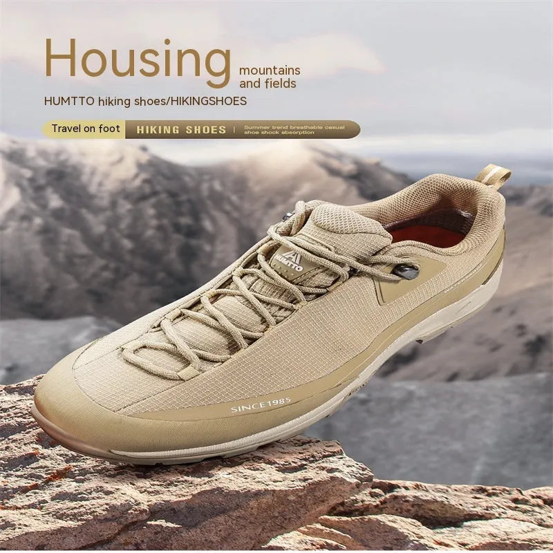 Men's low-top mountain climbing shoes with lace-up front and leather mesh upper