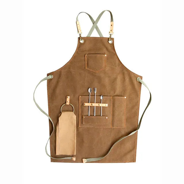 Canvas apron with cross-back straps in camel colour for kitchen and gardening protection