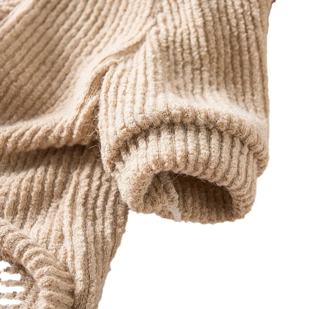 Brown knitted dog sweater pullover on small dog showing cloth construction and casual style
