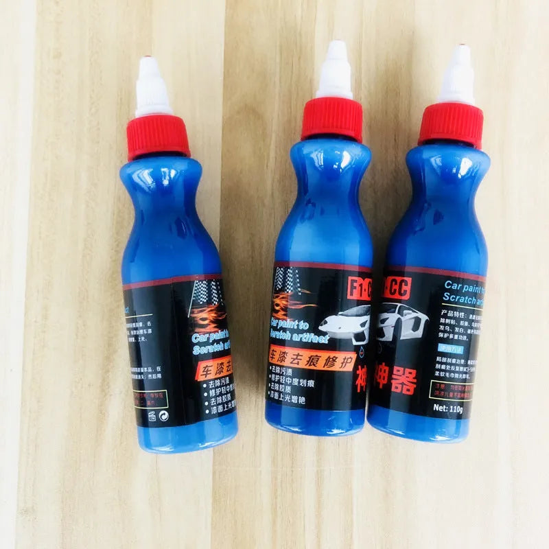 Blue car scratch repair kit with applicator tool for automotive paint touch-ups