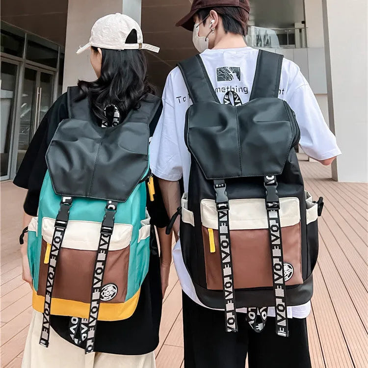 Oxford cloth backpack in black green or red colours showing dimensions and three carrying options
