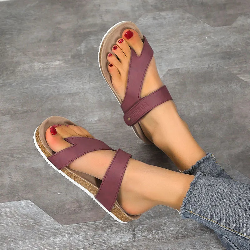 Thick-soled foam flip-flops with a flat toe ring in blue, shown on a white background.