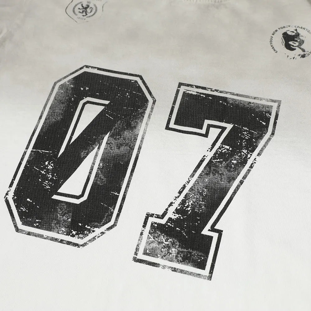Man wearing a black printed cotton short-sleeved T-shirt, front view.