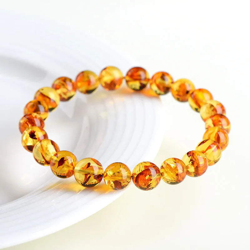 Natural yellow piebald amber bracelet with geometric beads in multiple diameter options
