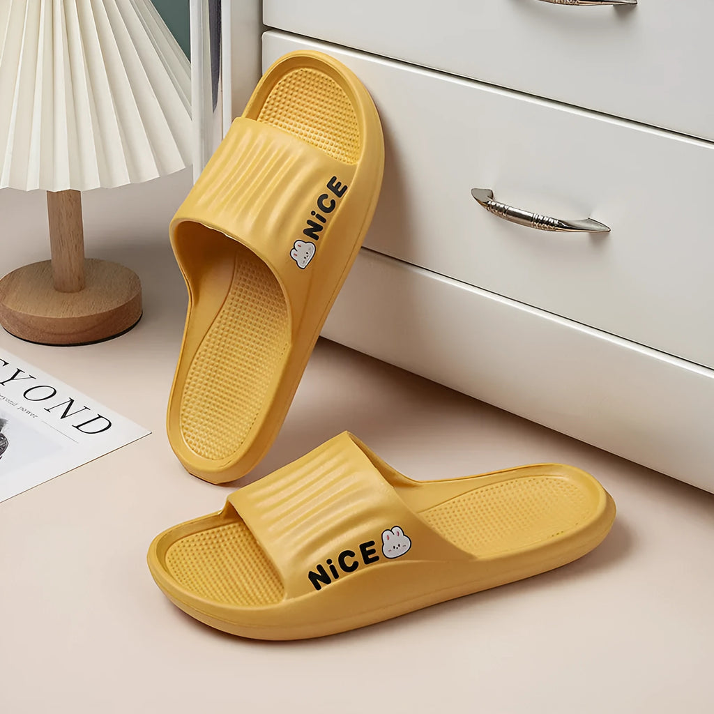 Cartoon pattern EVA flip flop slippers for adults on a plain background, showing non-slip sole and colour options.