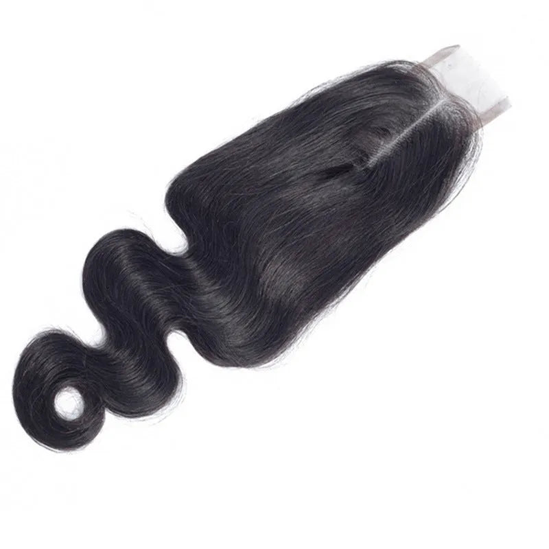 Straight style human hair wig in natural colour displayed on a stand, showing long lengths.