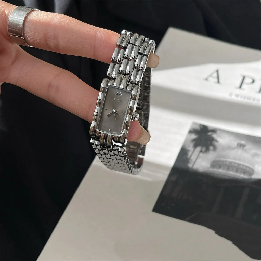 Women's silver and gold bracelet-style analogue watches with 15mm dials and butterfly clasps