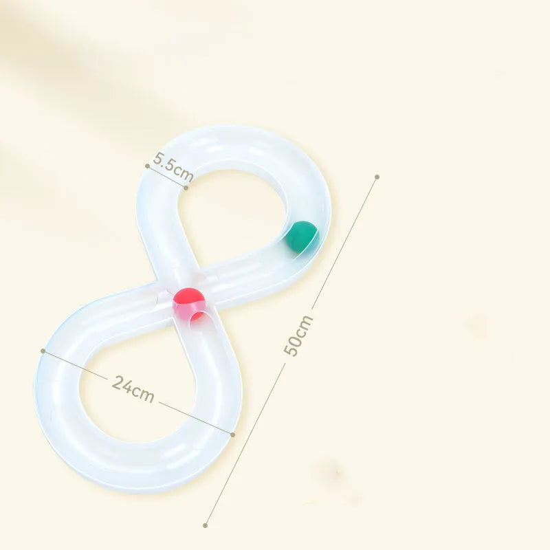Blue and white plastic cat turntable track ball toy with a teasing stick on a flat surface.