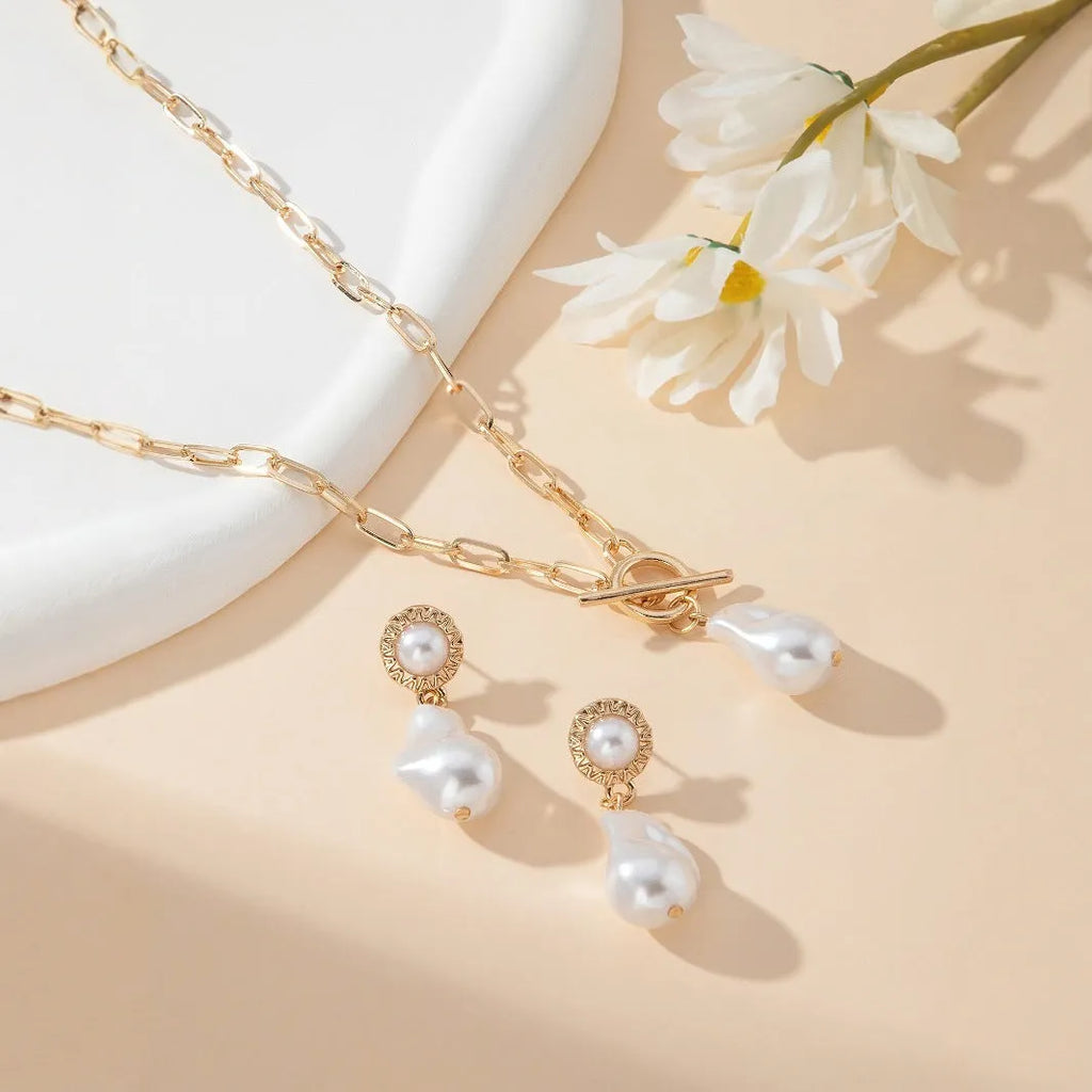 Gold baroque pearl pendant necklace and matching stud earrings jewellery set