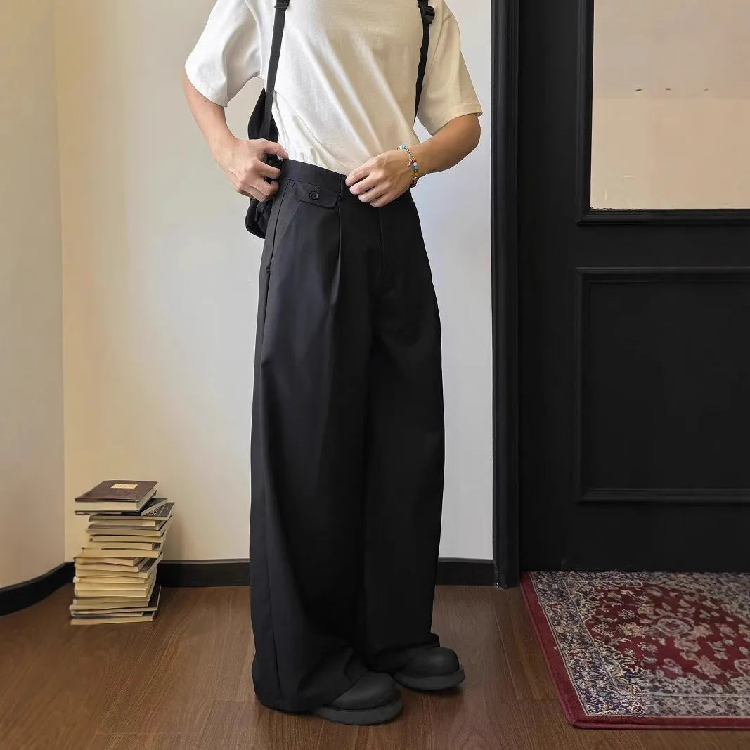 Men's brown straight-leg loose wide-cut casual trousers on a hanger