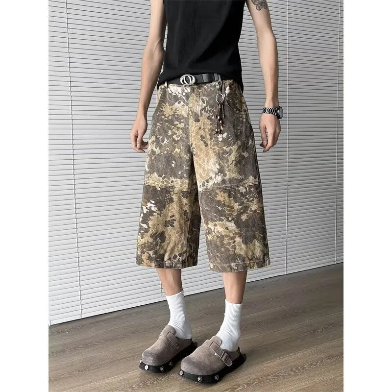 Yellow jeans with snake pattern camouflage design and cropped length