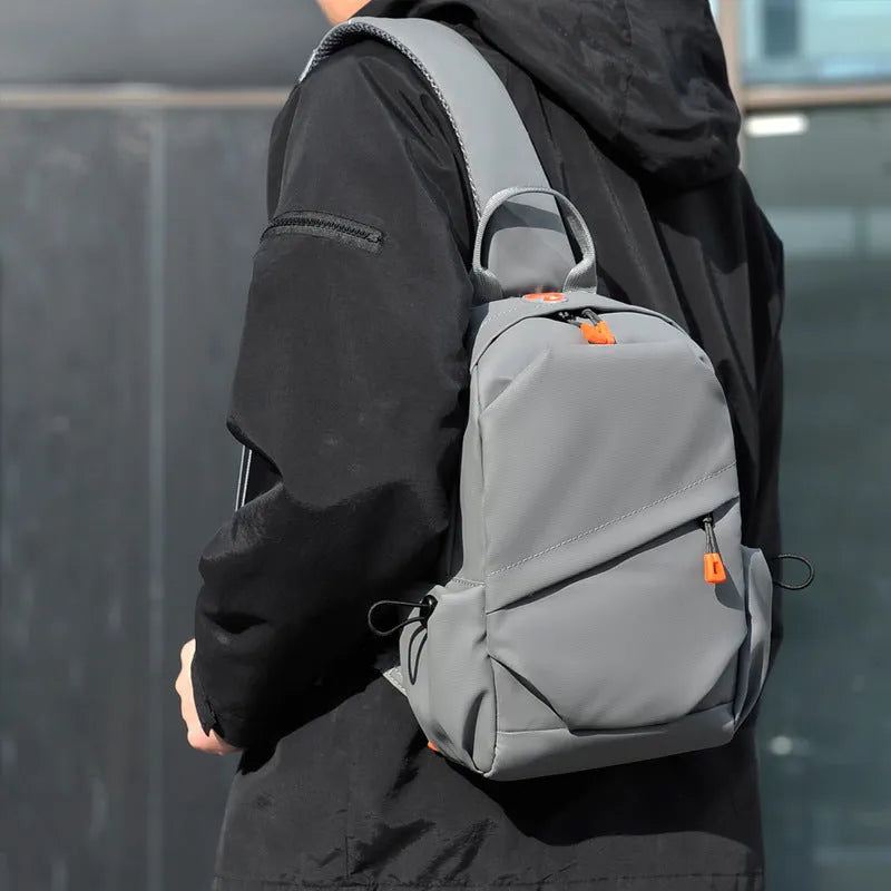 Men's black polyester crossbody bag with simple design and waterproof features
