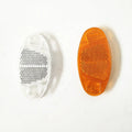 White and yellow plastic bicycle spoke reflector discs for night safety warning