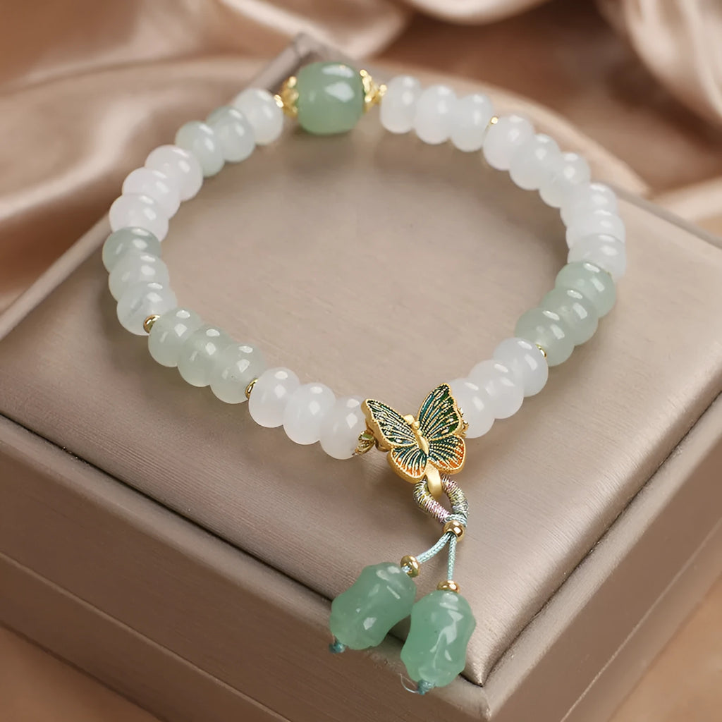 Green women's bracelet with Tian Shan Cui abacus beads and butterfly tassel