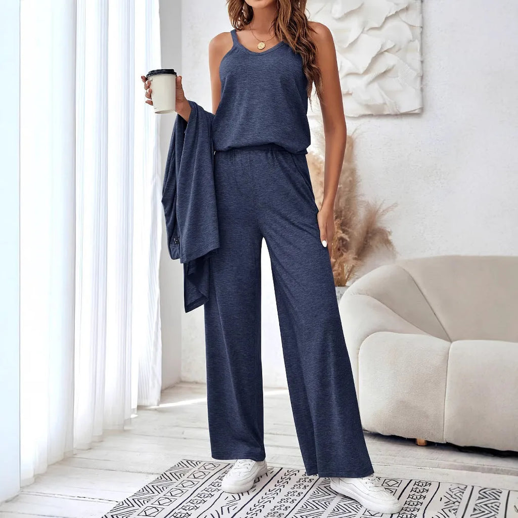 Blue women's three-piece trouser suit set with long cardigan on a hanger.