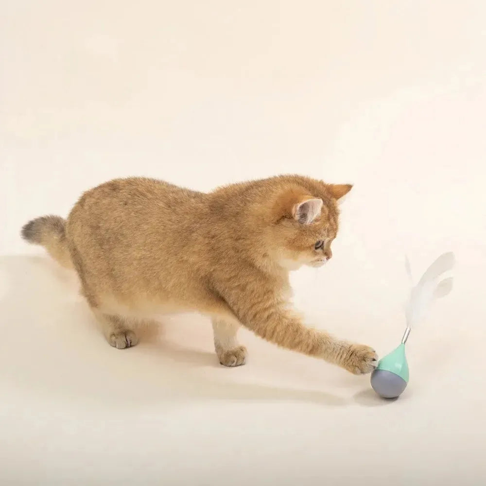 Green and pink feather tumbler cat toy with aluminium alloy frame and self-healing design
